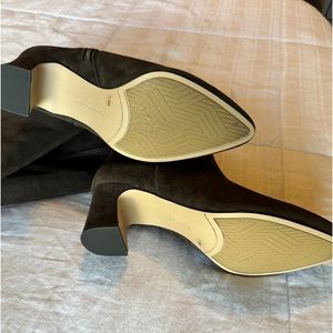 Women’s heeled boots: Sz 7.5M Never worn